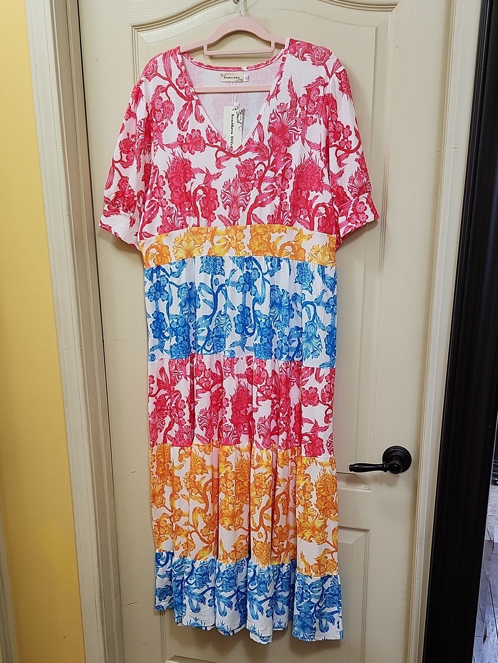 Southern Stitch Maxi Dress with a Vibrant Color-blocked Floral Design